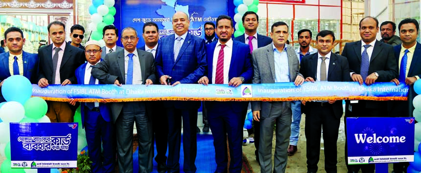 Syed Waseque Md Ali, Managing Director of First Security Islami Bank Limited, inaugurating an ATM booth at Dhaka International Trade Fair-2018 in the city on Monday. SM Nazrul Islam, Head of General Services Division, Shahazada Basunia, Head of PRD and Md