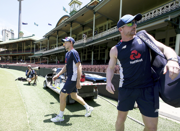 England's Joe Root (center) walks onto the Sydney Cricket Ground during training for their Ashes cricket Test match against Australia in Sydney on Tuesday. The Test begins on Thursday.