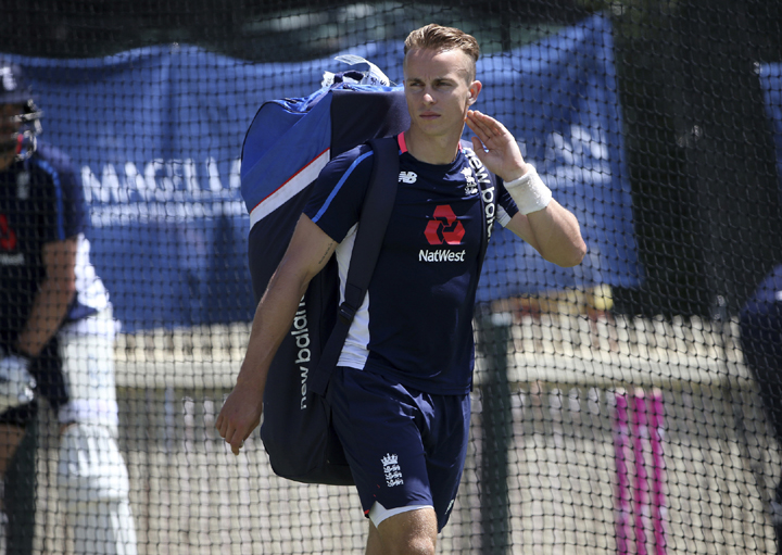 England's Tom Curran arrives to bat in the nets during training for their Ashes cricket Test match against Australia in Sydney on Tuesday. The Test begins today (Thursday).