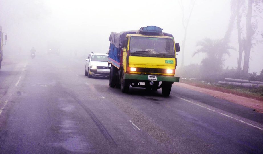 BOGRA: Vehiclesâ€™ movement being hampered due to dense fog on Bogra- Dhaka Highway yesterday.