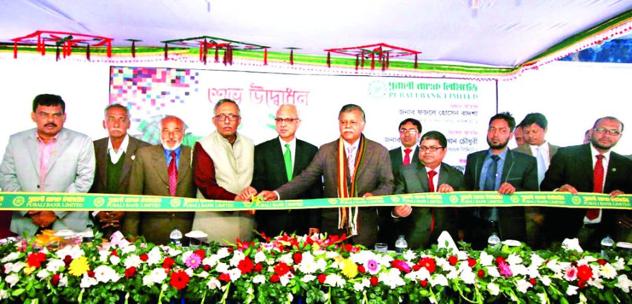 Fazle Hossain Badsha, MP of Rajshahi-2, inaugurating the 462nd branch of Pubali Bank Limited at Court Bazar in Rajshahi as chief guest recently. Shafiul Alam Khan Chowdhury, AMD of the bank and local elites were also present.