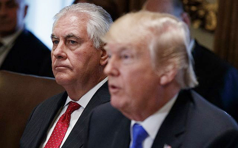 US Secretary of State Rex Tillerson listens as US President Donald Trump speaks during a cabinet meeting at the White House in Washington.