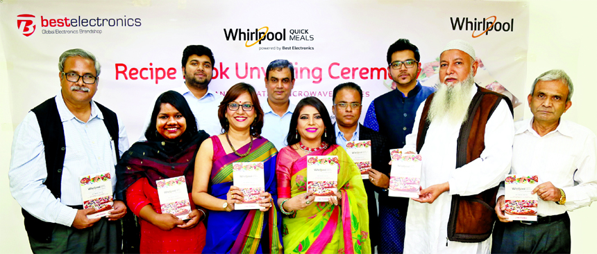 Syed Asaduzzaman, Managing Director of Best Electronics (Authorized Distributor of Whirlpool), unveiling artist Lobbi Rahman's Microwave Oven based recipe book, Whirlpool Quick Meals at company's head office in the city recently. The recipe book will be