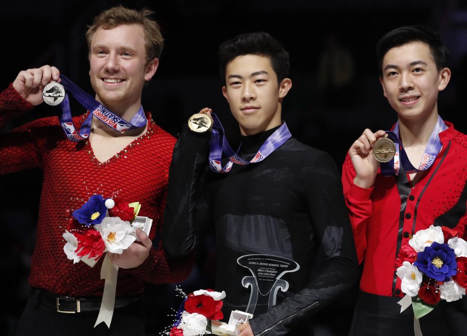 Nathan Chen (center) poses after winning the men's skate event between Ross Miner (left), who finished second and Vincent Zhou, who finished third at the U.S. Figure Skating Championships in San Jose, Calif. on Saturday.