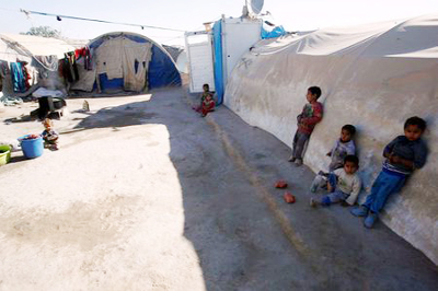 Displaced Iraqi children are seen at the Amriyat al Falluja camp in Anbar Province, Iraq.