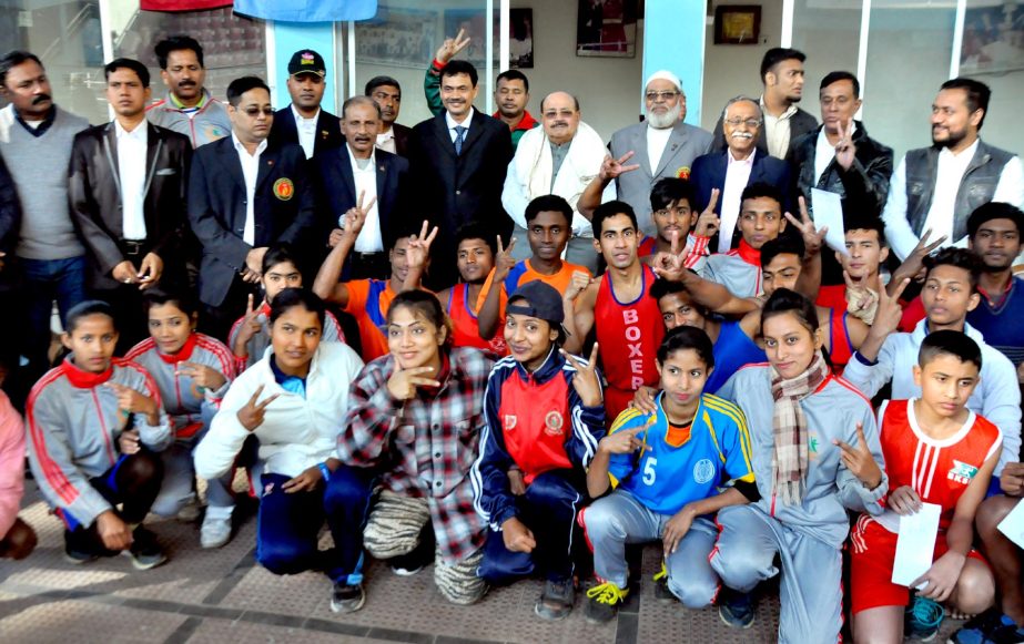 Winners of the boxing competition with the guests and officials at the Mohammad Ali Boxing Stadium in Palton on Monday.