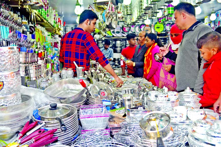 Visitors making rush at different stalls of Dhaka International Trade Fair despite shivering cold wave. This photo was taken on Monday.