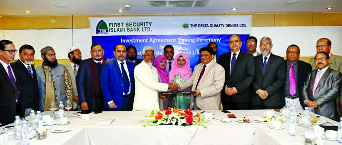 Abdul Aziz, DMD of First Security Islami Bank Limited and Engineer AKM Faruque Ahmed, Chairman of Delta Group Limited, exchanging an agreement signing documents at a city hotel on Monday. Syed Waseque Md Ali, Managing Director of the bank and high officia