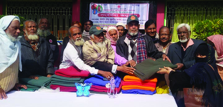 FARIDPUR(Madhukhali): Abdul Kasam Mridah, Freedom Fighter Commander, Madhukhali Upazila distributing blankets among the poor people Korkodi Union on Monday.