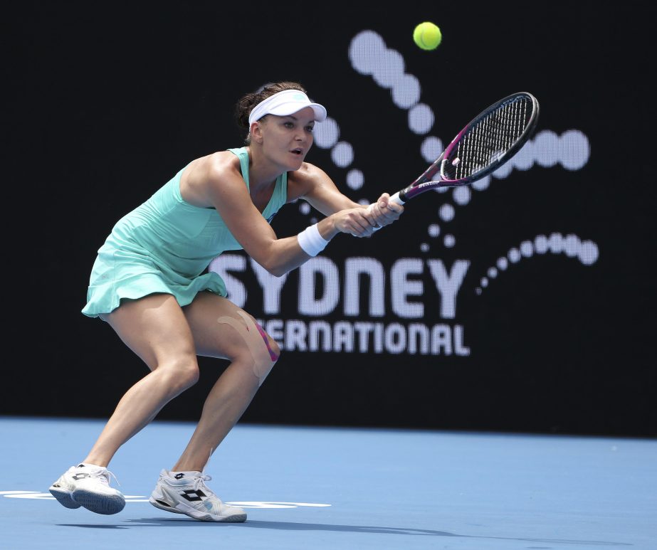 Agnieszka Radwanska of Poland plays a backhand to Johanna Konta of Britain during their women's singles match at the Sydney International tennis tournament in Sydney on Tuesday.