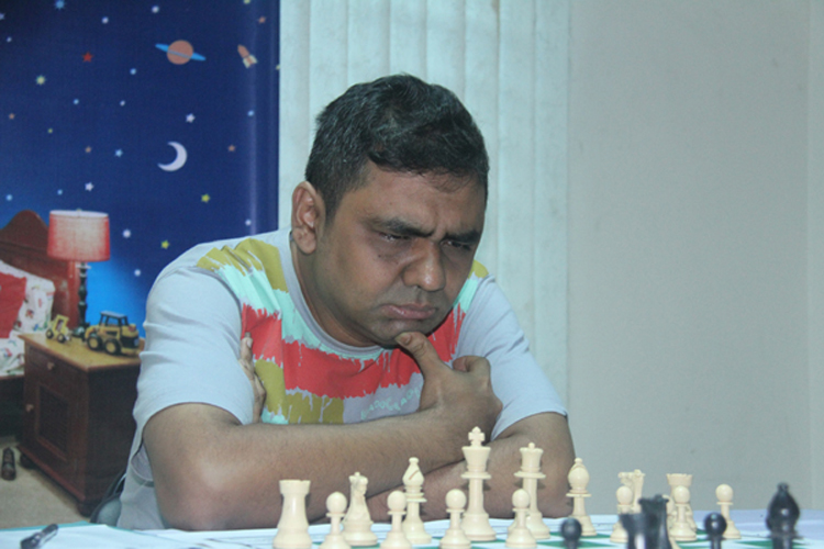 Grand Master Ziaur Rahman of Saif Sporting Club in action during the fourth round matches of the 18th Delhi Open International Grand Masters Chess Competition at New Delhi in India on Thursday. Zia earned maximum four points from his four matches.