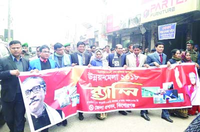 KISHOREGANJ: A rally was brought out on the occasion of Development Fair in Kishoreganj town yesterday. Additional Secretary Begum Roksana Kader and DC Azimuddin Biswas led the rally.