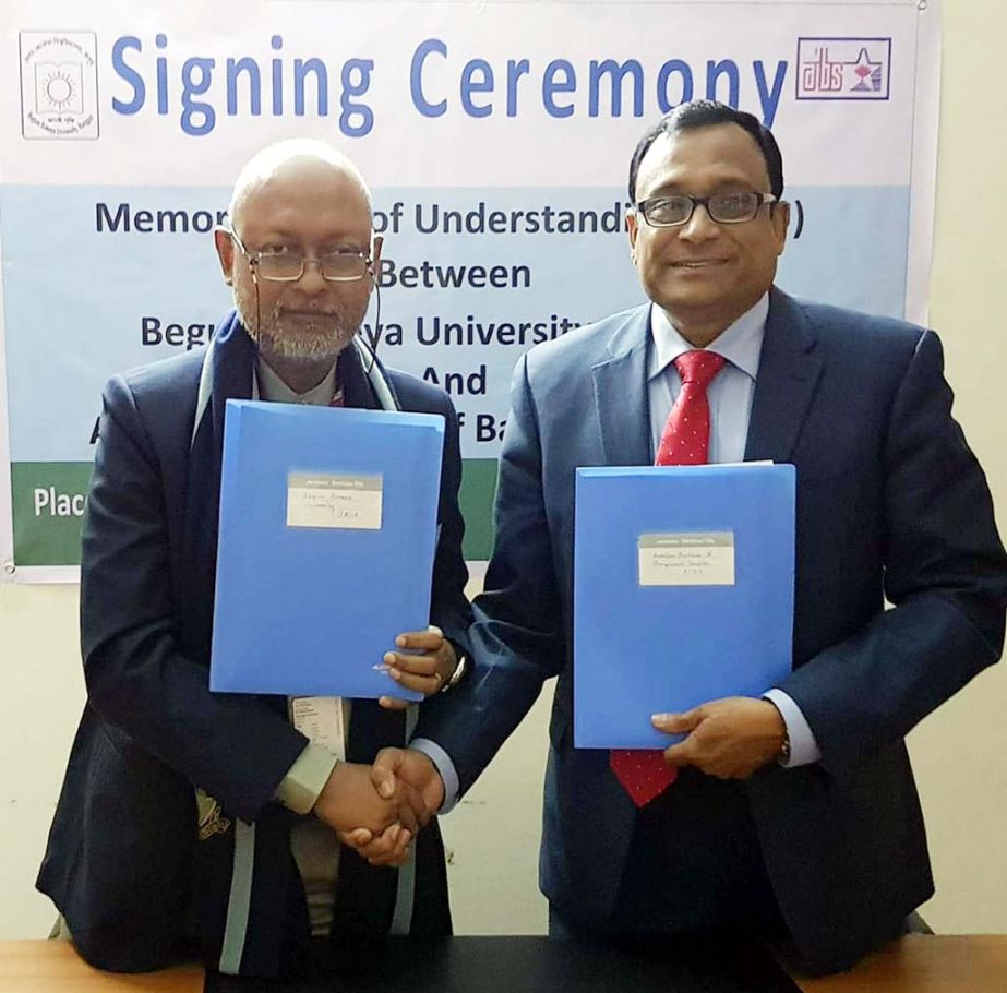 Prof Dr Nazmul Ahsan Kalimullah, BTFO, Vice Chancellor of Begum Rokeya University, Rangpur and Prof Dr Golam Matbor, President of American Institute of Bangladesh Studies shaking hands after signing an agreement on academic knowledge sharing at the Liaiso