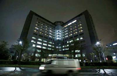 A van is seen on a road in front of Tokyo Regional Immigration Bureau which includes the Tokyo detention center in Tokyo.