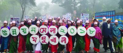 MADHUKHALI(Faridpur): Students of different educational institutions brought out a rally marking the Development Fair on Thursday.