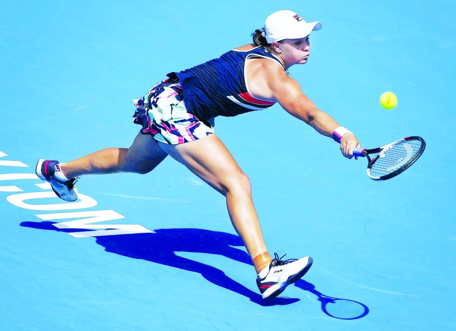 Ash Barty of Australia reaches for a backhand to compatriot Daria Gavrilova in their women's semifinal singles match at the Sydney International tennis tournament in Sydney on Friday.