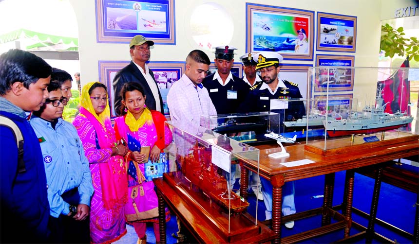 Commander M Ismail Majumder Shahin, addressing the visitors about the Bangladesh Navy at its stall in the last day of Development Fair at Shilpakala Academy in the city on Saturday. Senior officials of the Navy were also present.