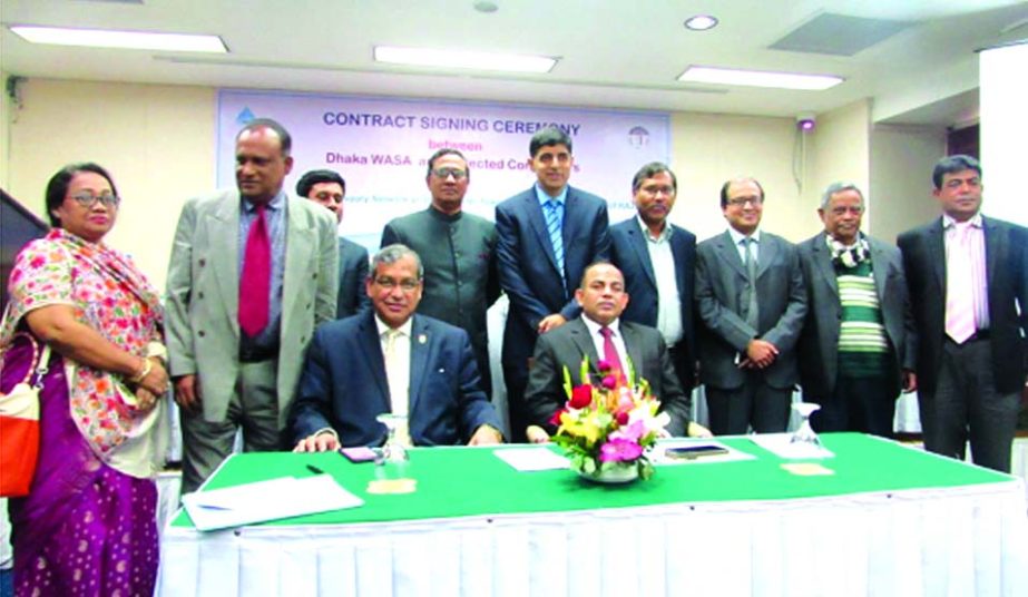 Engr. Taqsem A Khan, Managing Director of Dhaka WASA and Md Abdur Rahman, Chairman of RAJUK, poses after singing a contract at WASA Bhaban in the city recently. Dhaka WASA will set up water supply network in city's Uttara Model Town (3rd Phase) by June,