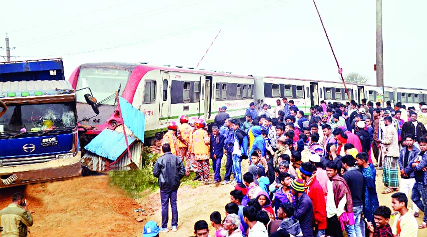 Demo train hit a truck on Dhaka- Chittagong Railway line in Comilla, causing disruption of communication for about six hours. This photo was taken from Comilla Sadar Panpara area on Saturday.