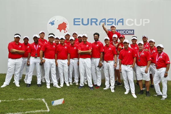 Team Asia pose for a group photo during the EurAsia Cup golf tournament at Glenmarie Golf & Country Club in Shah Alam, Malaysia on Sunday.