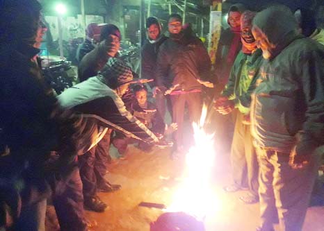 THAKURGAON: People at Pirganj East Chowraste warming themselves to get rid of cold wave. This picture was taken on Saturday.