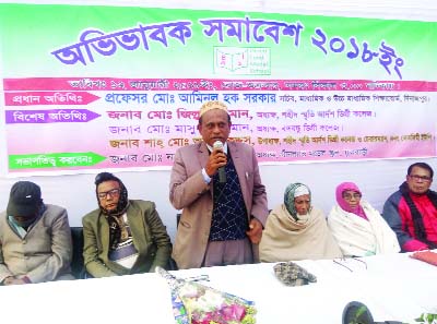 DINAJPUR (South): Prof Md Aminul Huq Sarkar, Secretary, Secondary and Higher Secondary Education Board, Dinajpur addressing guardians' gathering at Fulbari Upazila on Thursday.