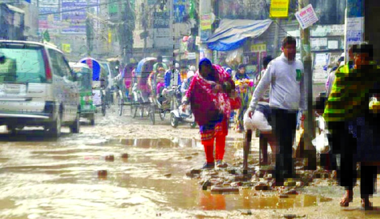 Pedestrians and also passengers suffering immensely as the water of sewerage line logging on the roads. The snap was taken from the city's Basabo area on Monday.