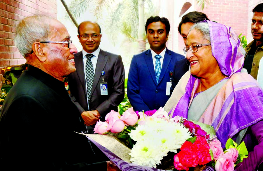 Prime Minister Sheikh Hasina receiving the visiting Indian former President Pranab Mukherjee at Ganabhaban on Monday. Photo: PID