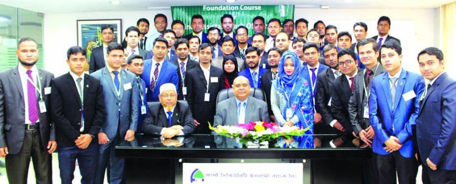 Syed Waseque Md. Ali, Managing Director of First Security Islami Bank Limited, poses with the participants of the 28th Foundation Course at its Training Institute in the city recently. Senior officials of the bank were present.