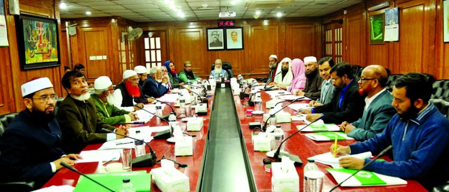 Sheikh Moulana Mohammad Qutubuddin, presiding over the Shariah Supervisory Committee meeting of Islami Bank Bangladesh Limited as Chairman at the banks head office in the city on Monday. Dr. Mohammad Abdus Samad, Member Secretary and other members of the