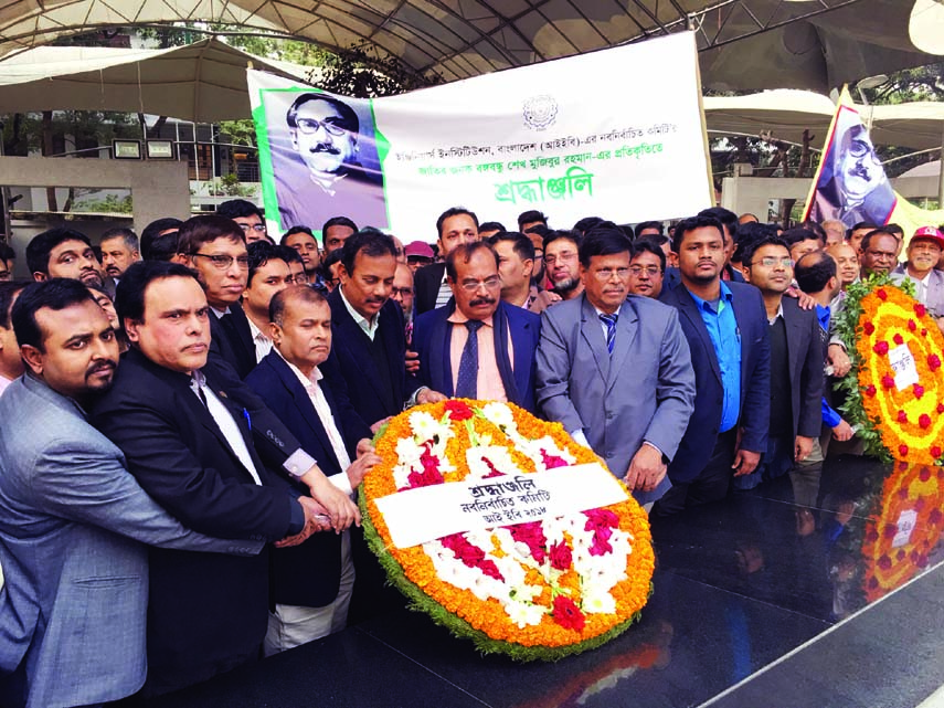 Newly-elected office-beaters of Engineers Institutions Bangladesh ( IEB) placing wreaths at the portrait of Bangabandhu Sheikh Mujibur Rahman at Bangabandhu Memoriul Museum at Dhanmondi in the city recently .