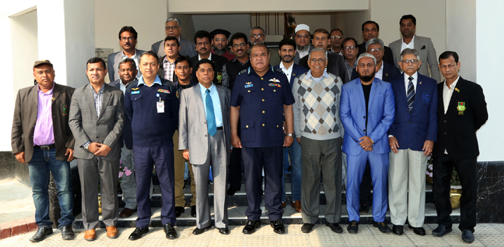The members of the newly formed Executive Committee of Bangladesh Hockey Federation with the President of Bangladesh Hockey Federation and Chief of Air Staff Air Marshal Abu Esrar pose for photograph at the Falcon Hall of Bangladesh Air Force on Wednesday