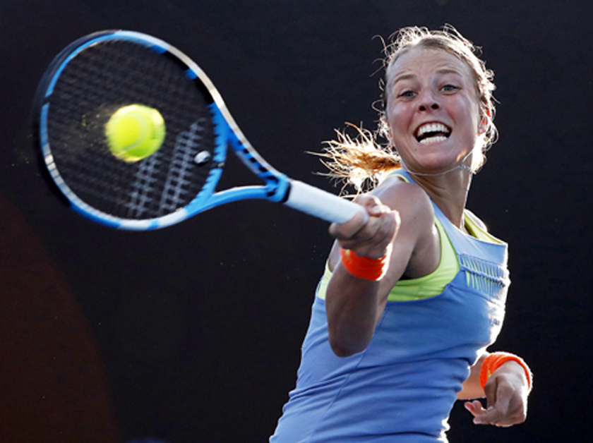 Anett Kontaveit of Estonia makes a forehand return to Germany's Mona Barthel during their second round match at the Australian Open tennis championships in Melbourne, Australia on Wednesday.