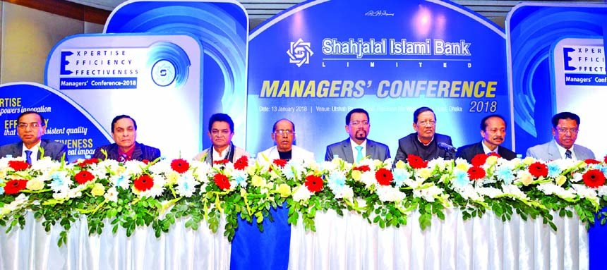 Akkas Uddin Mollah, Chairman, Board of Directors of Shahjalal Islami Bank Limited, presiding over its Managers Conference-2018 at a hotel in the city on Saturday. Farman R Chowdhury, Managing Director, Mohammed Golam Quddus, Vice-Chairman, AK Azad and Eng
