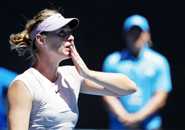 Russia's Maria Sharapova blows kisses to the crowd after winning over Latvia's Anastasija Sevastova in their second round match at the Australian Open tennis championships in Melbourne, Australia on Thursday.