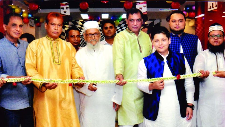 Habibur Rahman Sarker, Chairman of Brothers Furniture, inaugurating a new discount offer 5 to 15 percent on purchase holding a slogan "Shopno Shotti Hobe Notun Bochore" by cutting a ribbon recently. Elias Sarker, Managing Director and Sharifujjaman Sark