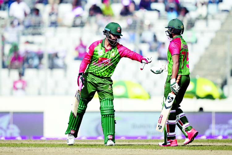 Shakib Al Hasan (right) congratulates his teammate Tamim Iqbal after scoring fifty runs during the Tri-Nation One Day International cricket series against Sri Lanka at the Sher-e-Bangla National Cricket Stadium in Mirpur on Friday.