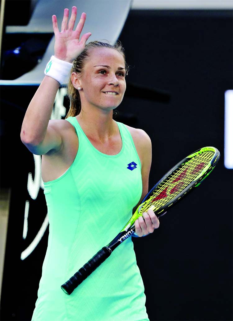 Slovakia's Magdalena Rybarikova waves after defeating Ukraine's Kateryna Bondarenko during their third round match at the Australian Open tennis championships in Melbourne, Australia on Friday.