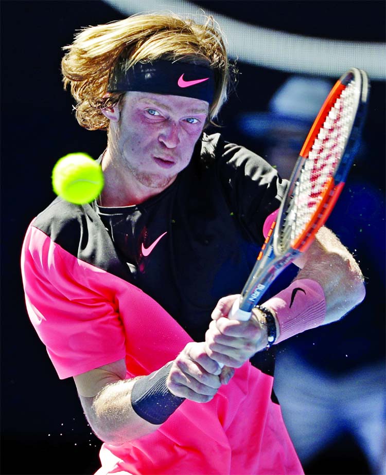 Russia's Andrey Rublev makes a backhand return during his third round match against Bulgaria's Grigor Dimitrov at the Australian Open tennis championships in Melbourne, Australia on Friday.