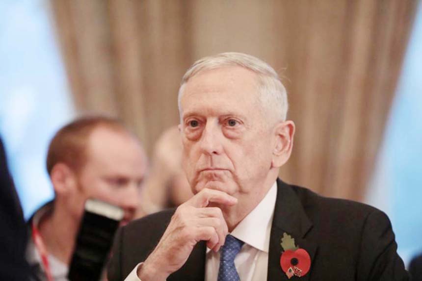 US Secretary for Defense, Jim Mattis, sits opposite Britain's Secretary of State for Defence, Gavin Williamson, before a meeting at the Ministry of Defence (MoD) in central London.