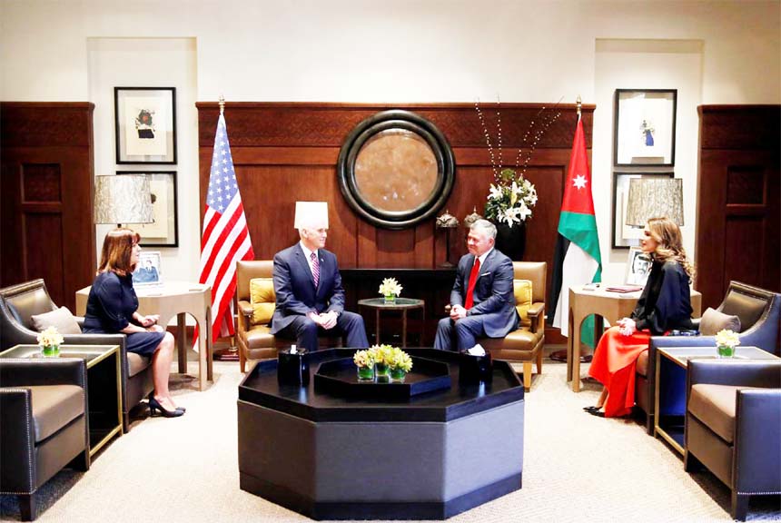 Jordan's King Abdullah, his wife Queen Rania Â®, meet with U.S. Vice President Mike Pence, and wife Karen Pence, at the Royal Palace in Amman, Jordan on Sunday.