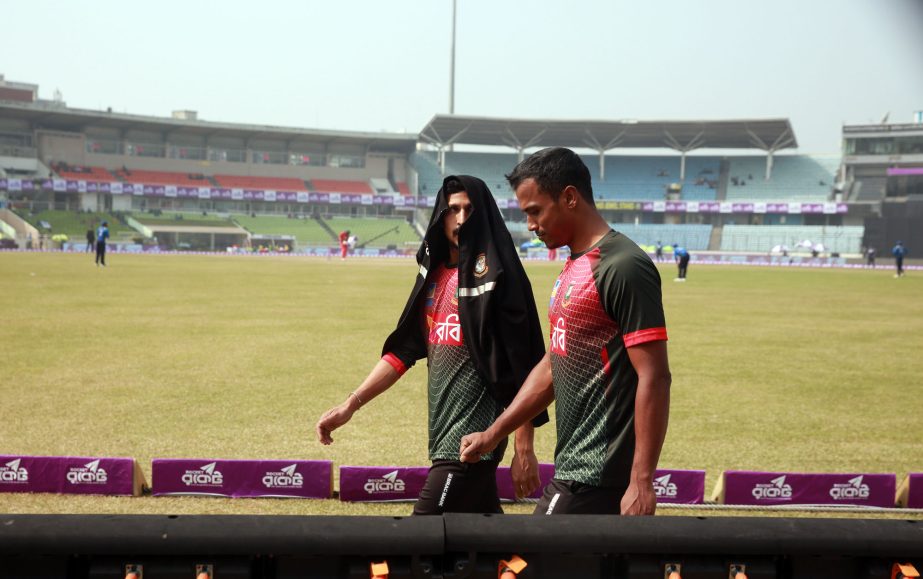 Mohammad Nasir Hossain (left) and Rubel Hossain walking during the practice session at the Sher-e-Bangla National Cricket Stadium in the city's Mirpur on Sunday.