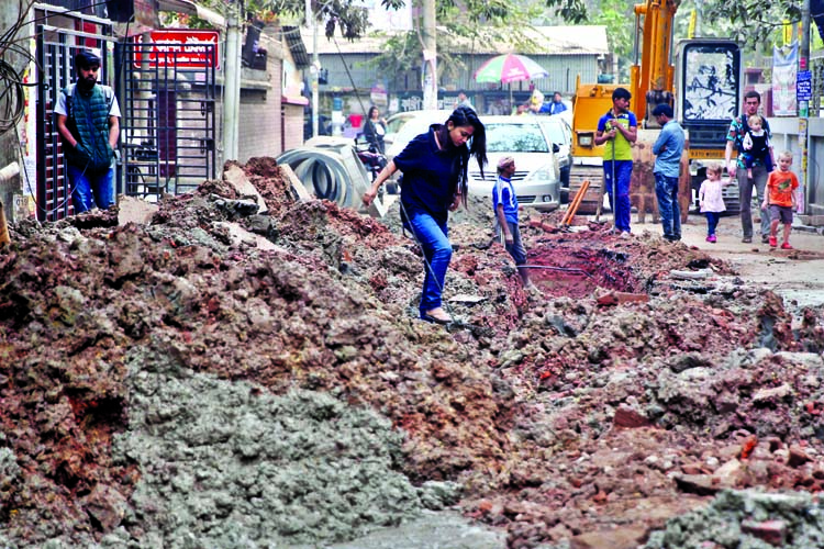 Pedestrians and also passengers facing acute problems due to road digging in the name of utility services. The snap was taken from the city's Lalmatia area on Tuesday.