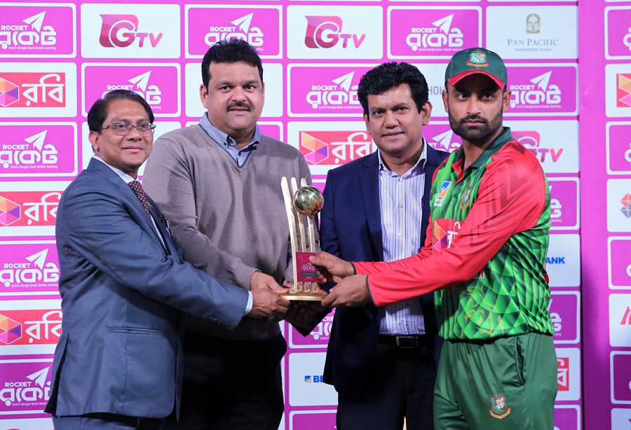 Tamim Iqbal receiving the Man of the Match award after the fifth match of the Tri-Nation ODI series between Bangladesh and Zimbabwe at the flood-lit Sher-e-Bangla National Cricket Stadium in the city's Mirpur on Tuesday.