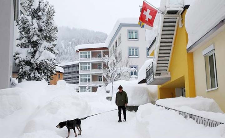 So much snow has built up on the slopes surrounding Davos that avalanches remain a danger.