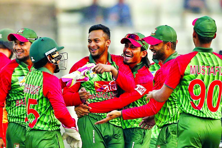 Bangladesh team celebrating victory over Zimbabwe in the fifth match of the Tri-Nation ODI series at the flood-lit Sher-e-Bangla National Cricket Stadium in the city's Mirpur on Tuesday.