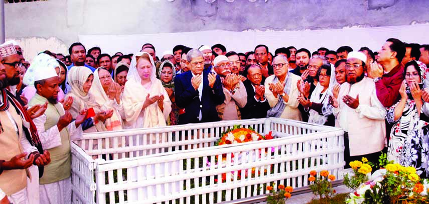 BNP Chairperson Begum Khaleda Zia along with her relatives, party leaders and activists offering munajat at Banani Graveyard marking the 3rd death anniversary of her younger son Arafat Rahman Koko in the city yesterday .