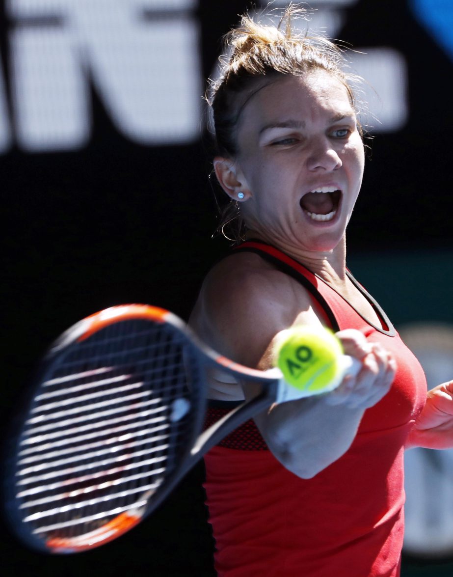 Romania's Simona Halep makes a forehand return to Karolina Pliskova of the Czech Republic during their quarterfinal at the Australian Open tennis championships in Melbourne, Australia on Wednesday.