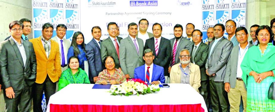 Md Arfan Ali, Managing Director of Bank Asia Limited, poses after signing an agreement on promoting digital financial inclusion at the head office of Shakti Foundation in the city on recently.