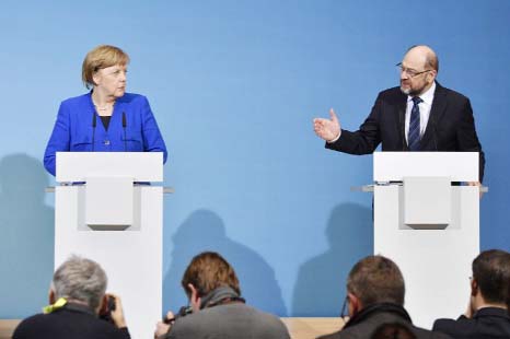 As coalition haggling resumes, Merkel races to shore up power.